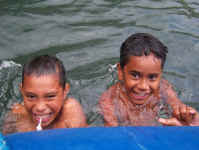 boys and dinghy.jpg (76582 bytes)